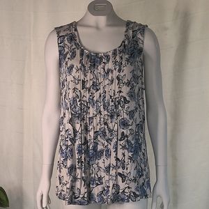 White top w/ blue flowers